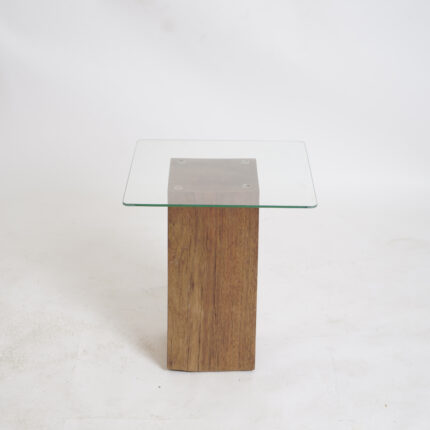 Wooden table with glass top